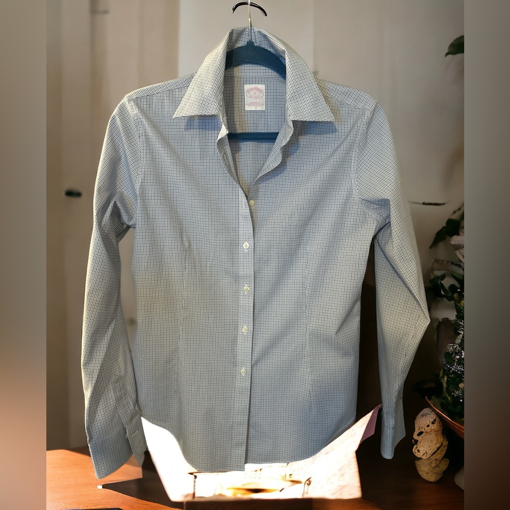 New woman’s fitted checkered blouse.